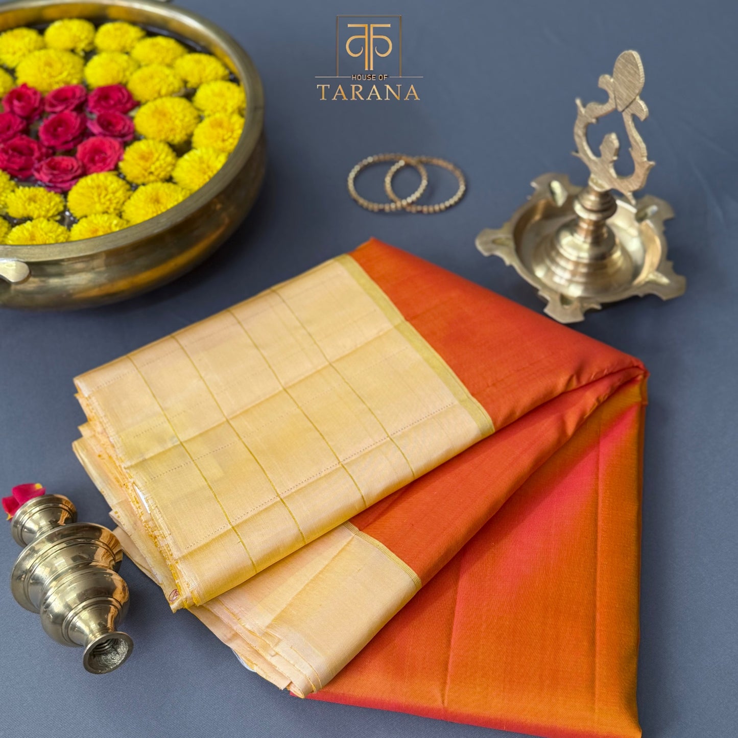 Burnt orange with pastel gold kanjivaram silk saree