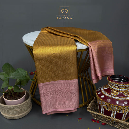 Gold with rose pink border saree